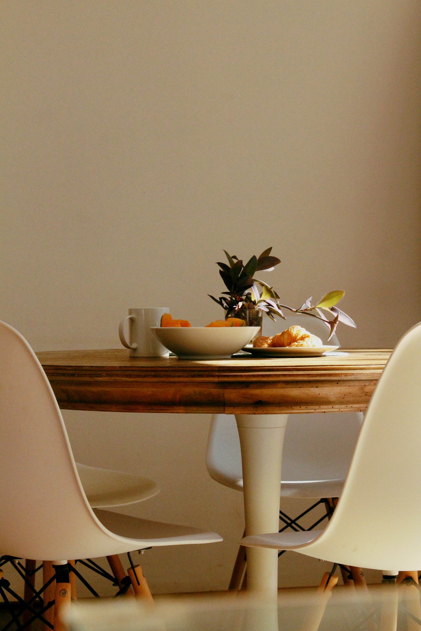 Croissant Bread Beside Bowl and Mug on Table